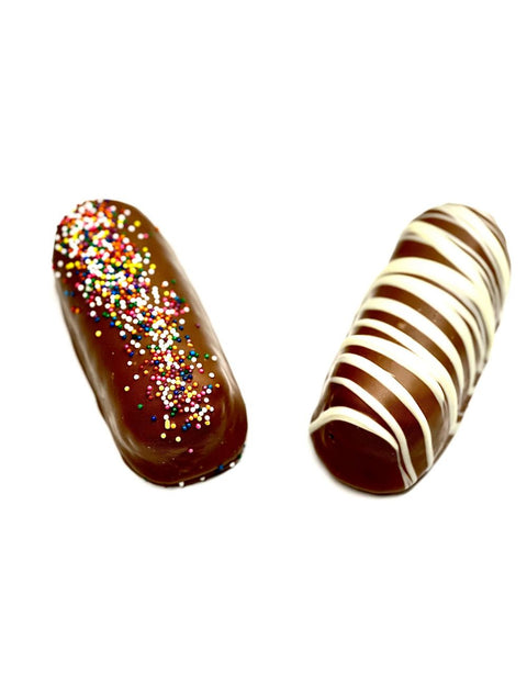 Delicious Milk Chocolate Covered Twinkie by Phillips Chocolate, a sweet treat layered in rich milk chocolate.