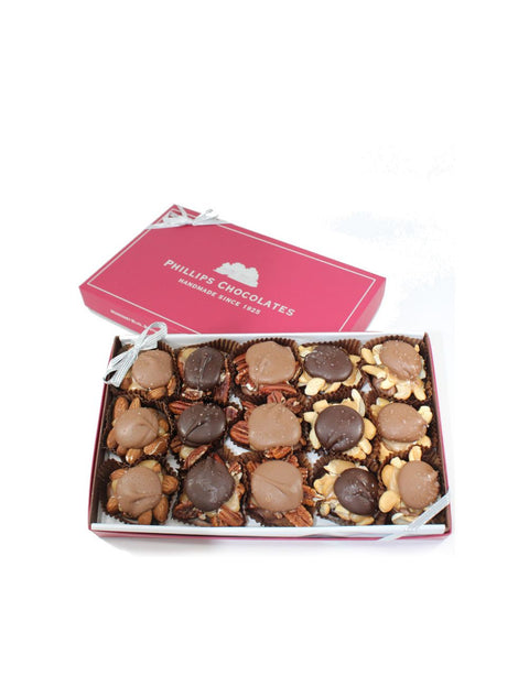 15 pack of sea salt turtles in a chocolate box neatly arranged from Phillips chocolates in Boston MA