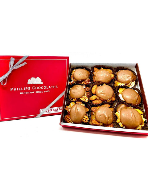 9 pc SEA SALT TURTLES - milk chocolate treats from Phillips Chocolate, perfect for gifting or indulging your sweet tooth.