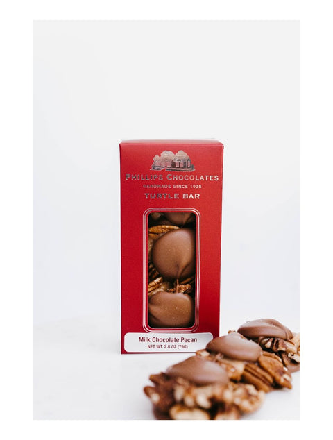 Delicious Turtle Bar with Pecan and Milk chocolate by Phillips Chocolate, beautifully packaged in a box.