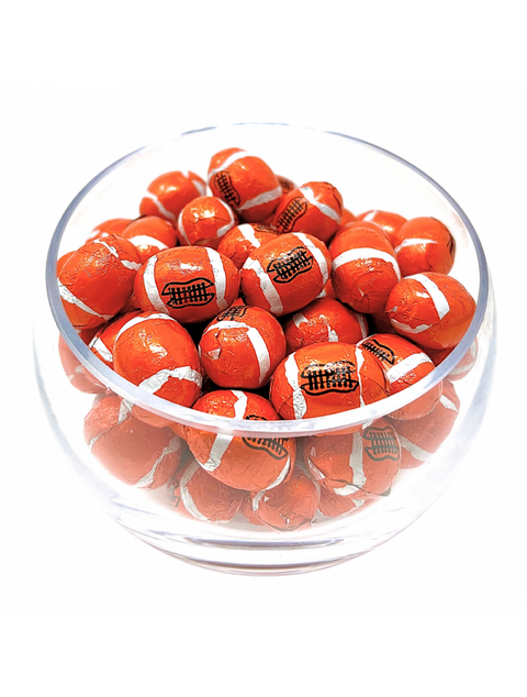 Delicious Milk Chocolate Footballs in half-pound bags from Phillips Chocolate, perfect for sports fans and chocolate lovers.