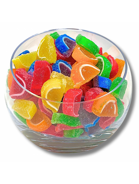 Colorful Mini Fruit Slices candies by Phillips Chocolate, featuring chewy gummy texture and sparkling sugar crystals, perfect for snacking and decorating desserts.