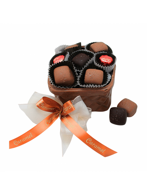 Chocolate Sea Salt Caramel Basket filled with rich milk and dark chocolate caramels and topped with sea salt.