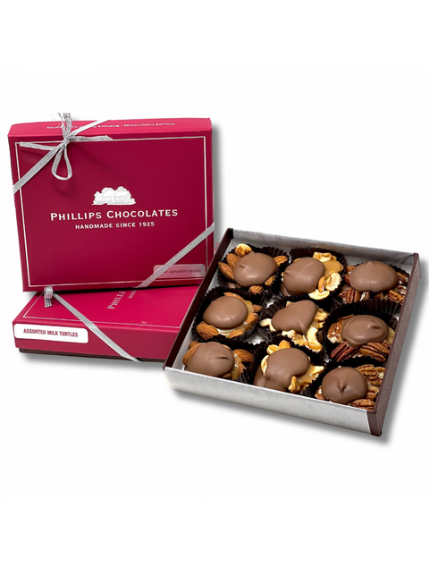 Delicious 9 pack MILK TURTLES from Phillips Chocolate, featuring a mouthwatering combination of milk chocolate and creamy caramel.