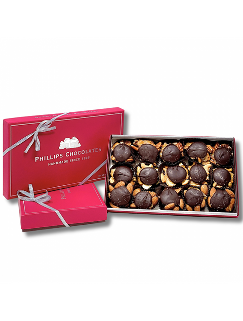 Delicious 15 pc SEA SALT TURTLES - dark chocolate with crunchy almonds, buttery cashews, and classic pecans, topped with Himalayan sea salt for the perfect sweet and salty treat.