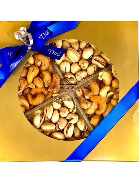 Father's Day Nut Round gift box featuring mixed nuts, roasted pistachios, salted cashews, and cinnamon glazed nuts, presented with a festive Father's Day ribbon.