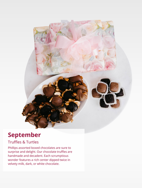 Indulge in the Chocolate of Month Club offering a variety of delicious chocolates by Phillips Chocolate.
