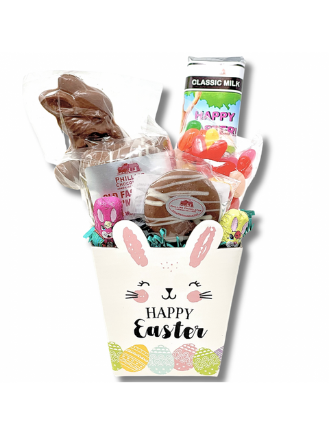 Easter Fun Box filled with sweet treats including s'mores, milk chocolate bar, chocolate pop, milk chocolate Oreo, and festive foiled chocolate bunnies and eggs from Phillips Chocolate.