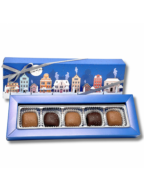 Sea Salt Caramel Sampler Holiday from Phillips Chocolate featuring a delicious 6 pack of milk and dark caramels sprinkled with Himalayan salt, perfect for gifting or indulging during the holiday season.