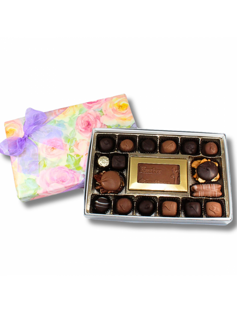 Easter Celebration Box filled with rich milk and dark chocolates, turtles, and a festive chocolate Easter greeting plaque from Phillips Chocolate.