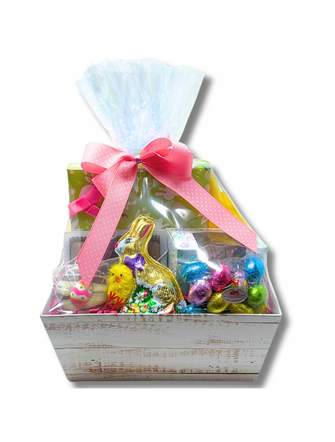 Basket of Goodies filled with delicious treats including an Easter Splendor Box, Milk Chocolate Fudge Egg, Sea Salt Caramels, Milk Chocolate Eggs, and a Solid Milk Chocolate Rabbit from Phillips Chocolate.