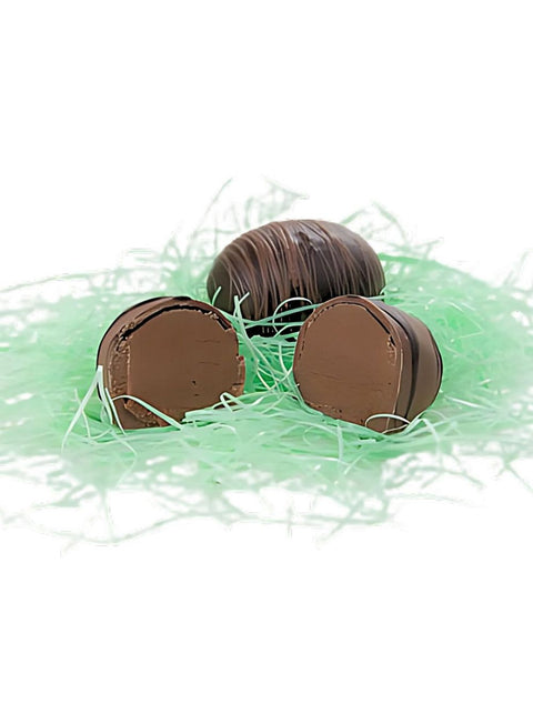 SMALL MILK FUDGE EGG - A Creamy Chocolate Fudge Cream Center, featuring handmade chocolate fudge inside a milk chocolate shell with a dark chocolate drizzle.