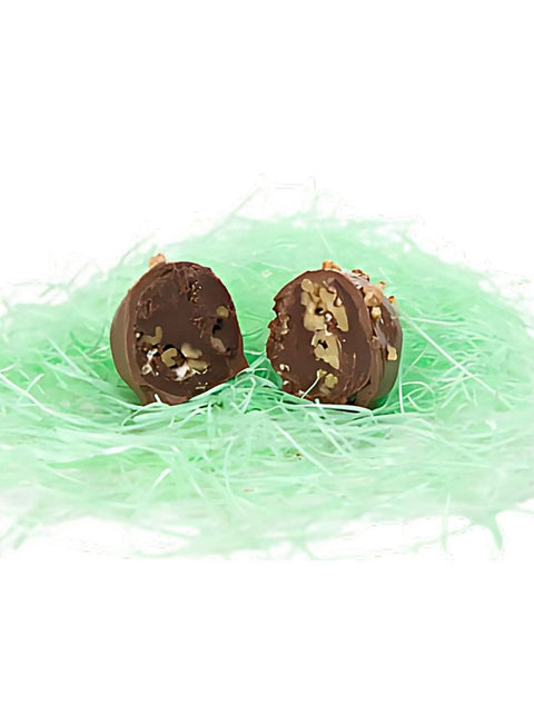 SMALL ROCKY ROAD EGG - Delicious chocolate fudge with marshmallows and chopped walnuts enveloped in a chocolate shell, sprinkled with walnuts.